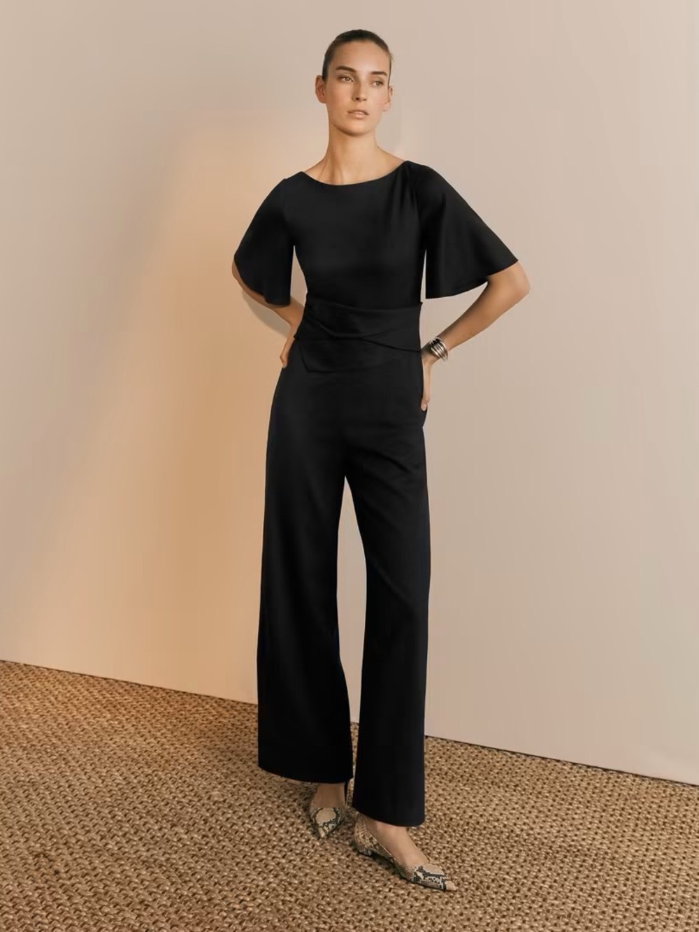 The Fold London Black Wide-Leg Jumpsuit with Flutter Sleeves